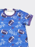CLOVER COTTAGE - GRIDIRON FOOTBALL ROMPER - BLUE - CLOSE UP ARM - https://tammysoutfitters.com/collections/clover-cottage 