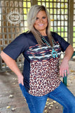 Sane Wagon top with leopard Aztec and black design short sleeves by Sterling Creek front side view