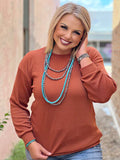 Long-sleeved cuffed ribbed women's shirt - rust with necklace