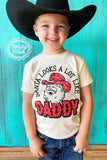 Kids Christmas T-shirt. Features the words Santa looks a lot like Santa on the front.