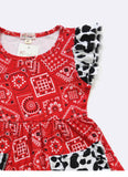 Clover Cottage Red Bandanna Girls Dress - Close up Red Bandanna and Black and White cow print -https://tammysoutfitters.com