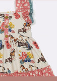 Children's dress with horse and floral pattern on a white background