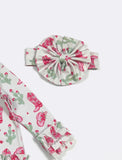 Baby headband and bib with cactus and cowboy boot pattern on a white background
