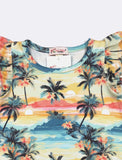 Tropical patterned shirt with palm trees and sunset design on a white background