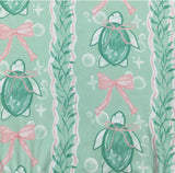 Pattern of green turtles with pink bows and decorative elements on a light green background