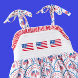 Children's dress with American flag design on a white background