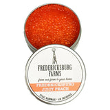 Fredericksburg Farms Juicy Peach air freshener in a metal tin with a white label.