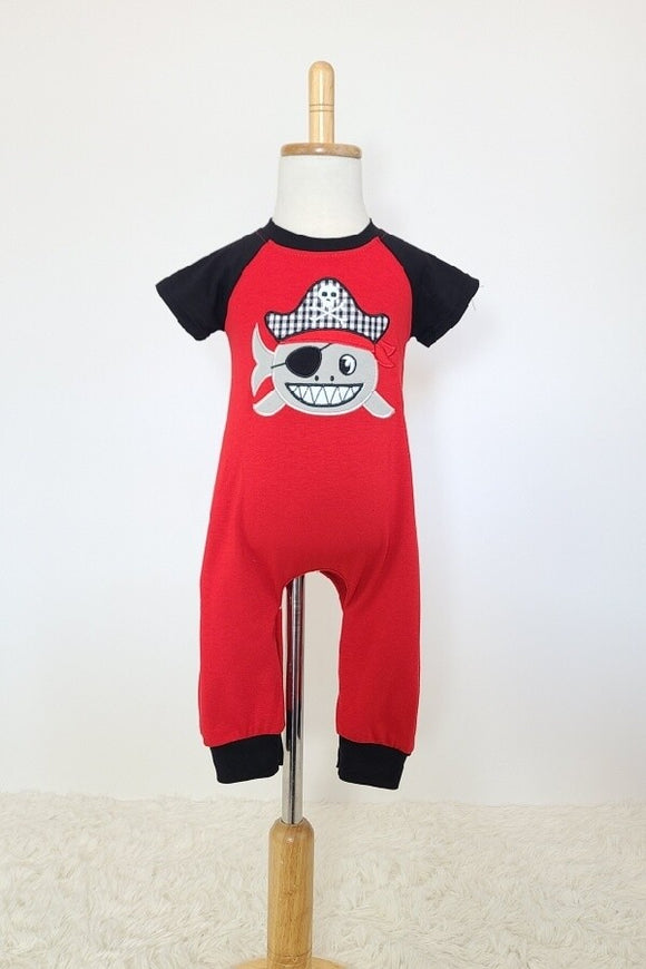 Clover Cottage short sleeved baby shark pirate romper with black sleeves and leg cuffs.