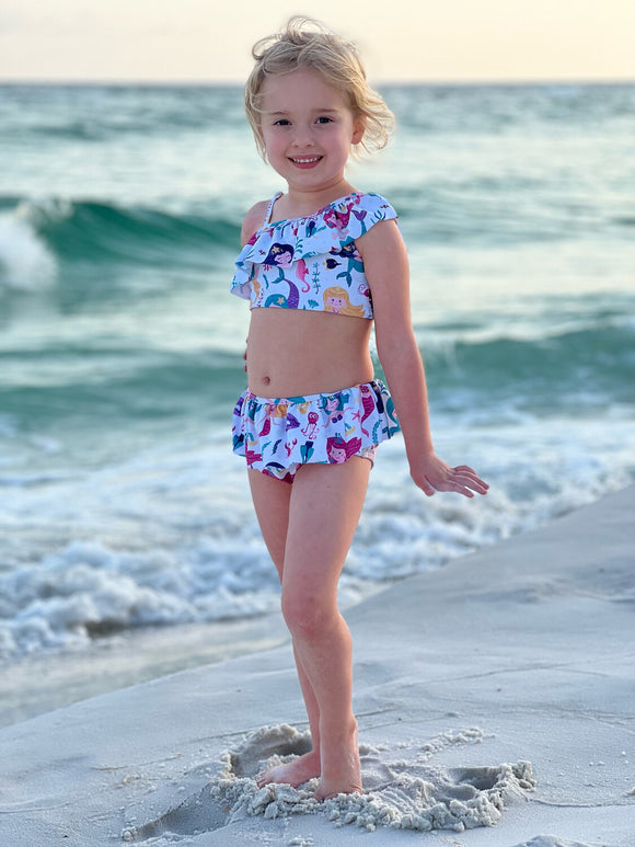 White background swimsuit with mermaids and sealife by Clover Cottage