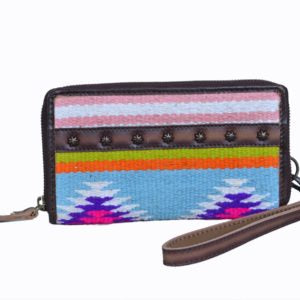 Large women's wristlet wallet made from leather and woven cotton