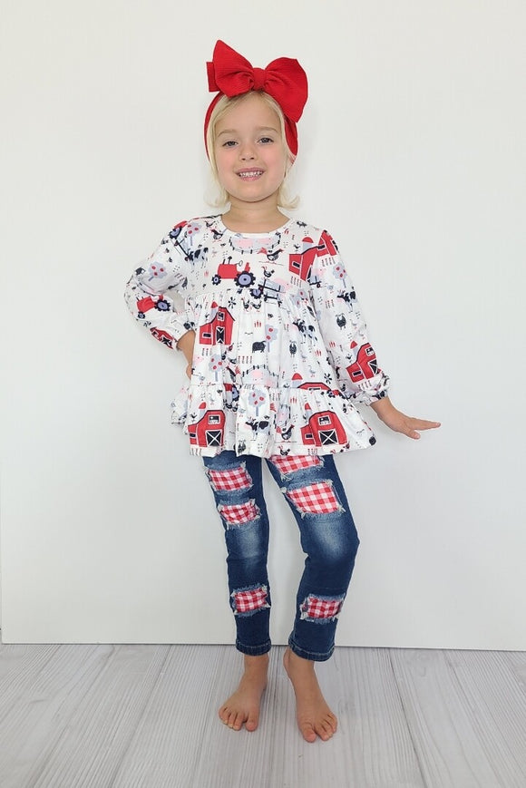 Model is wearing size 7/8 red barn tractor shirt with denim pants by clover cottage
