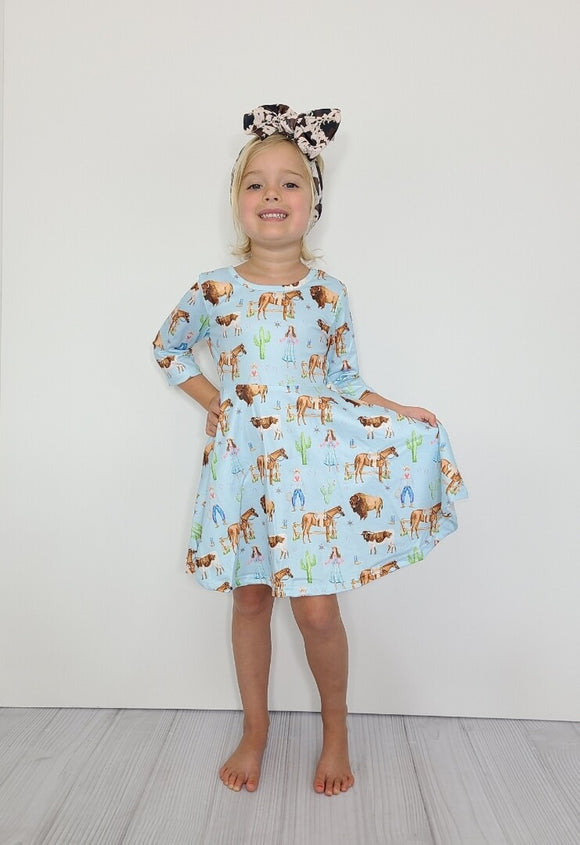 Sky ranch dress by Clover Cottage - youth size - young girl model, Bow not included