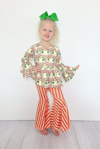Girl's Christmas outfit with flare pants and a vintage st nick printed top
