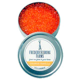 A small, round tin Fredericksburg Farms air freshener with a Orange solid color interior, labeled 'Orange Vanilla'.