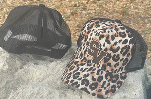 Smithson Valley High School logoed leopard print trucker hat. black mesh and snapback with ponytail opening.