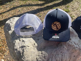 Trucker hat with a Smithson Valley volleyball leather patch.