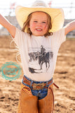 Child's working cowboy image t-shirt being worn by a happy girl in a straw cowboy hat. Sterling Kreek