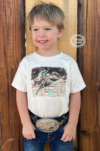 Wyatt  Tee Sterling Kreek t-shirt. Little boy in denim and belt buckle with wood background.
