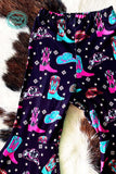 Girls flare pants with boots and cowboy hats. Closeup