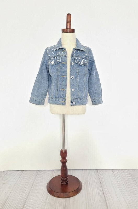 Denim jacket for girls with pearls on the shoulders.