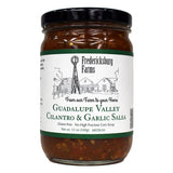 12 oz jar of Guadalupe Valley Cilantro & Garlic Salsa by Fredericksburg Farms.