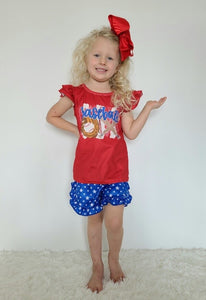 Little girl short set with a red shirt with baseball, glove and bats on chest. blue stared shorts by Clover Cottage