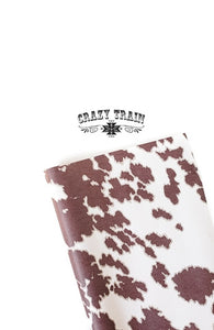 Cowhide print Wrapping paper by Crazy Train.